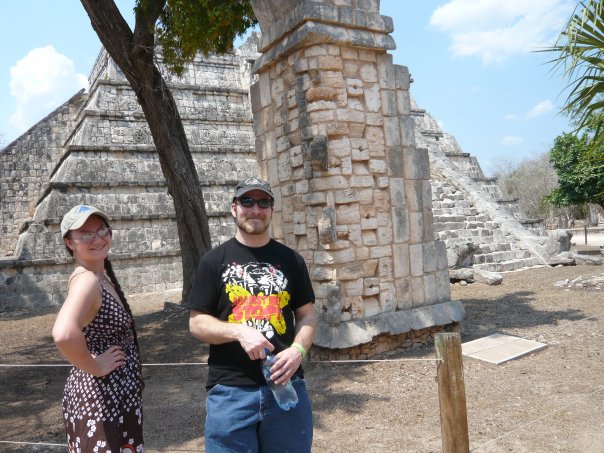 Daphne and I at Chichen Itza — the Ossuary pyramid behind us, Mom sensibly waiting in the AC